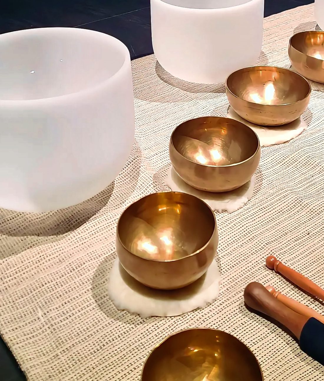 Singing bowls and crystal bowls used during the sound bath
